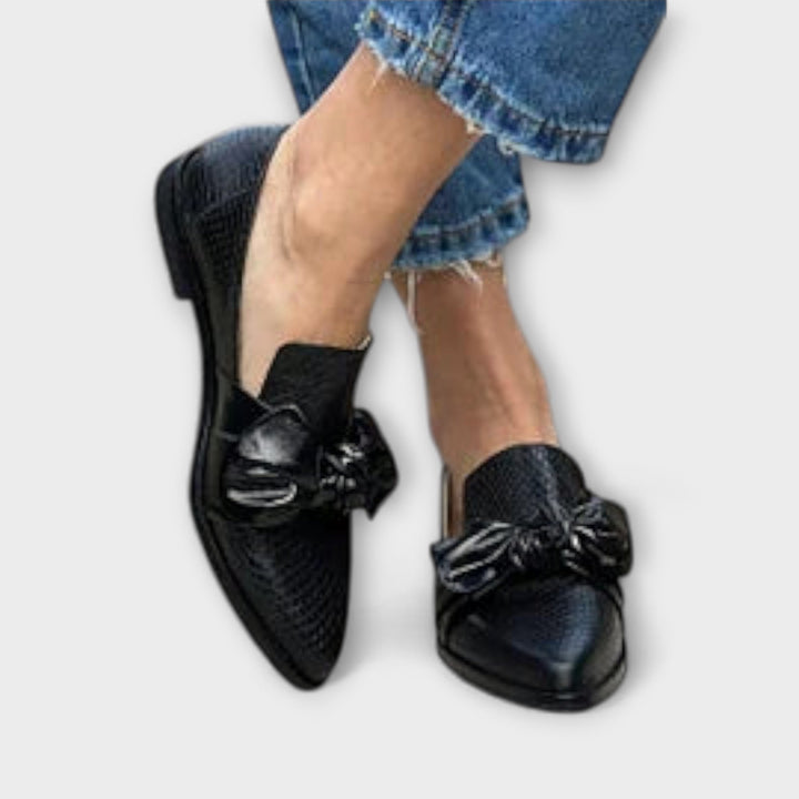 Zinnia – Black Loafers with Snake Skin Pattern and Bow Detail